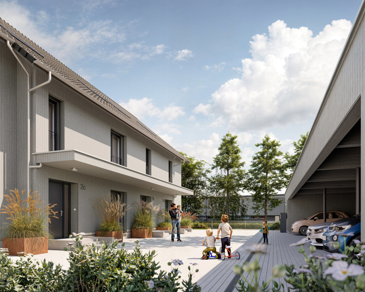 Der gemeinsam genutzte Hausvorplatz bietet Platz für Spiel und Begegnung